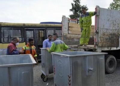 تصاویر سطل های تازه زباله در مشهد ، شیوه ای خاص برای جلوگیری از دسترسی زباله گردها